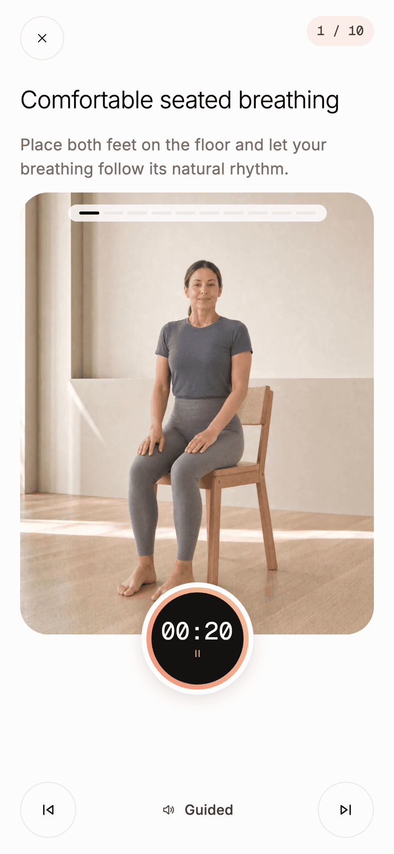 The Player screen: one seated movement demonstrated in video, the timer ring and the guided mode.